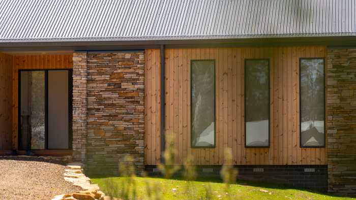 Luna Wood external cladding and Boral Stone fire place