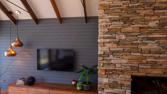 Painted Lunawood lining, Boral Stone fire place and Spotted Gum rafters